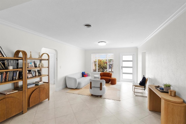 living room with crown molding and light tile patterned floors