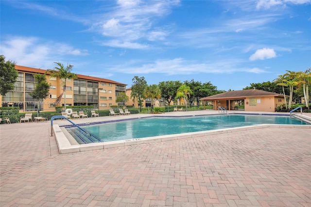 view of pool featuring a patio