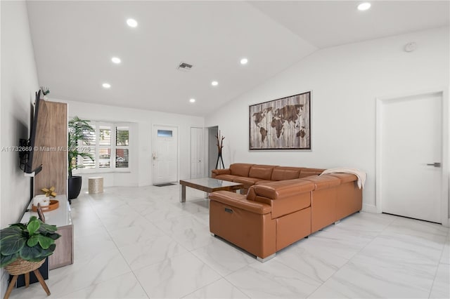 living room with lofted ceiling