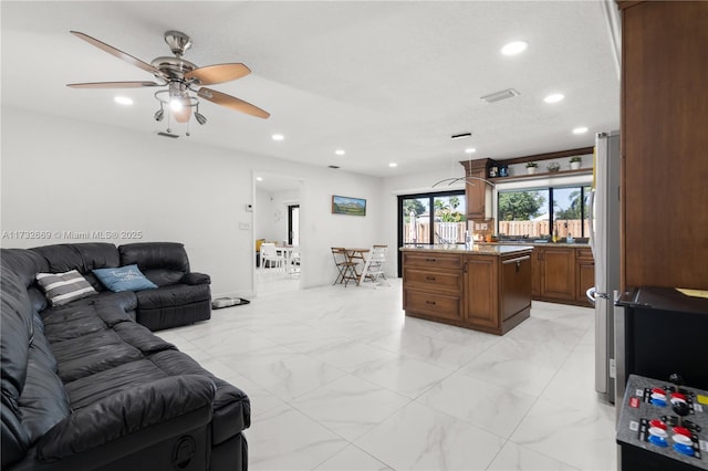 living room with ceiling fan