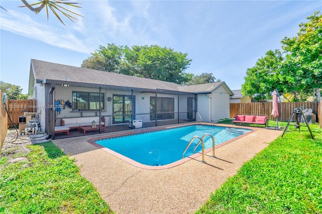 view of swimming pool with outdoor lounge area and a patio area