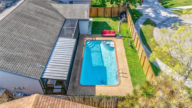 view of swimming pool featuring a patio area