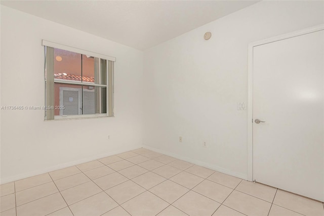 view of tiled spare room