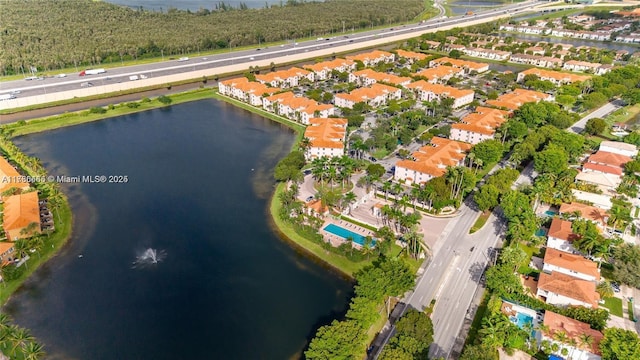 drone / aerial view featuring a water view