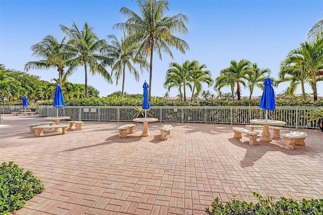 view of home's community with a patio area