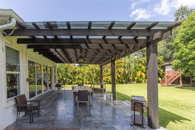 view of patio / terrace featuring a pergola and ceiling fan