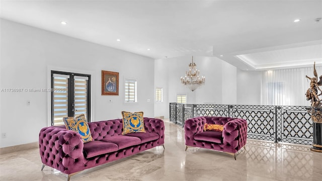 living room featuring a chandelier