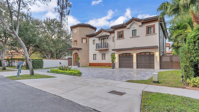 mediterranean / spanish-style house featuring a garage