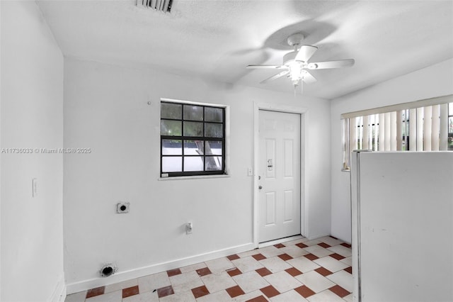 washroom featuring ceiling fan and hookup for an electric dryer