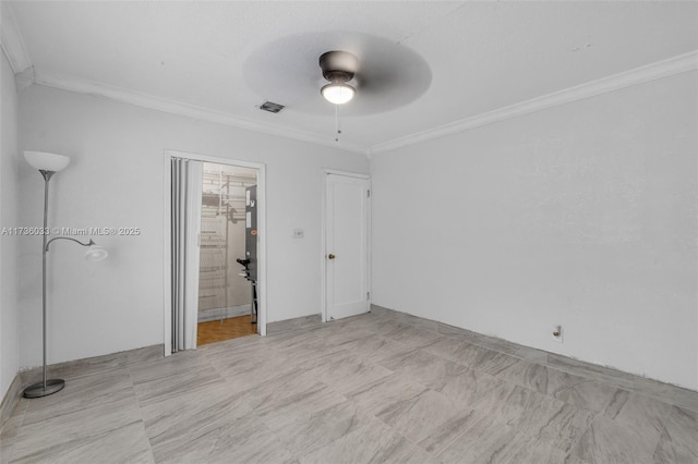 unfurnished bedroom featuring connected bathroom, crown molding, and ceiling fan