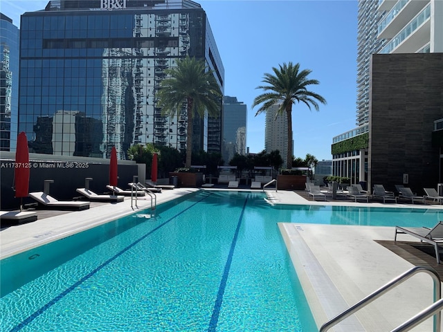 view of pool featuring a patio area