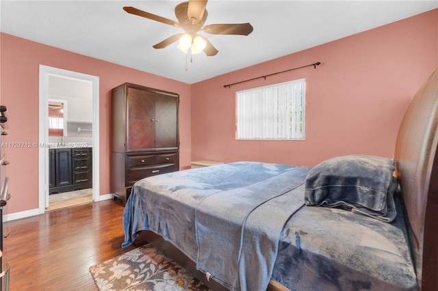 bedroom featuring ceiling fan and dark hardwood / wood-style flooring