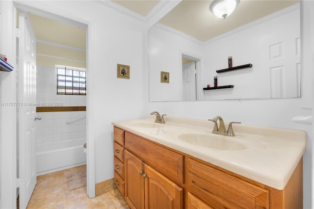 bathroom featuring crown molding, a tub to relax in, and vanity