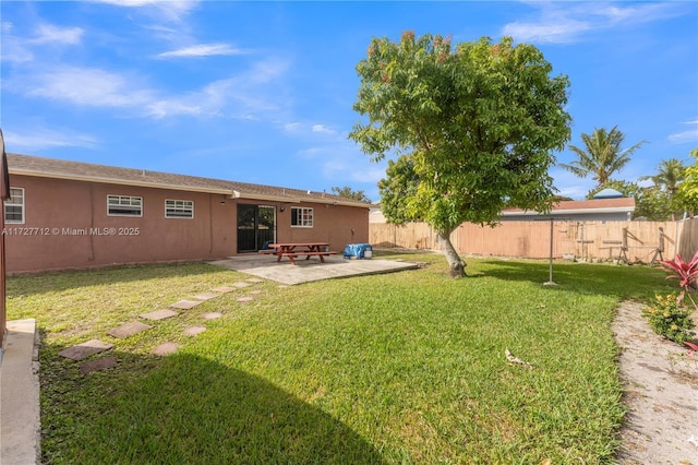 view of yard with a patio area