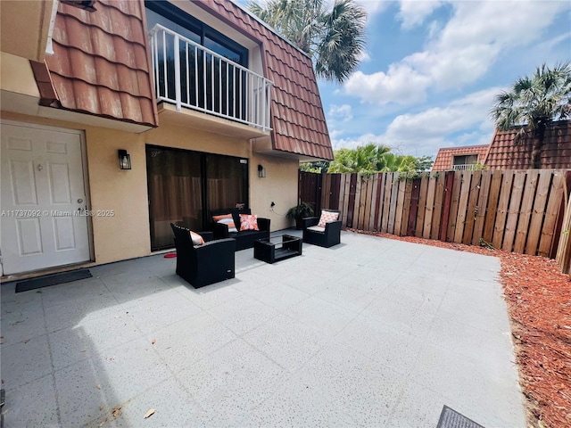 529 Green Springs Pl, West Palm Beach, FL 33409 - view of patio with an outdoor hangout area, a balcony, and fence