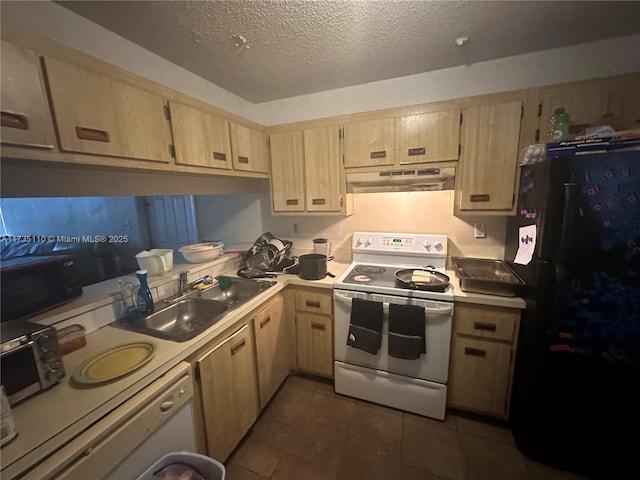 kitchen with sink, light brown cabinets, and black appliances