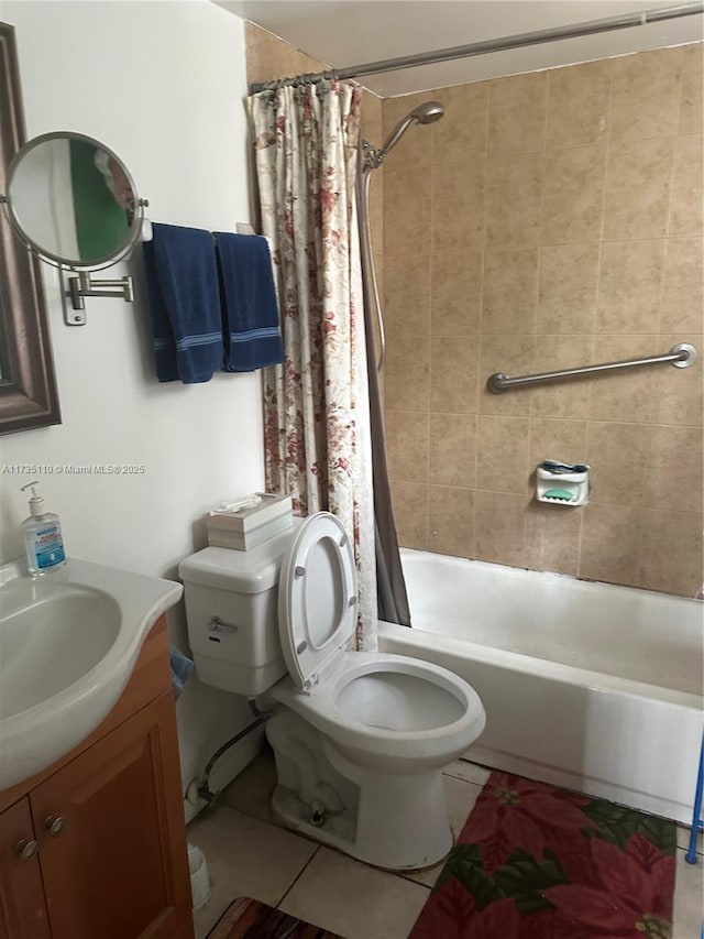 full bathroom with vanity, shower / tub combo with curtain, tile patterned floors, and toilet