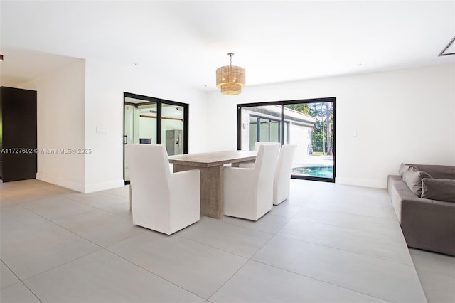 14135 N Miami Ave, Miami, FL 33168 - dining area with light tile patterned floors
