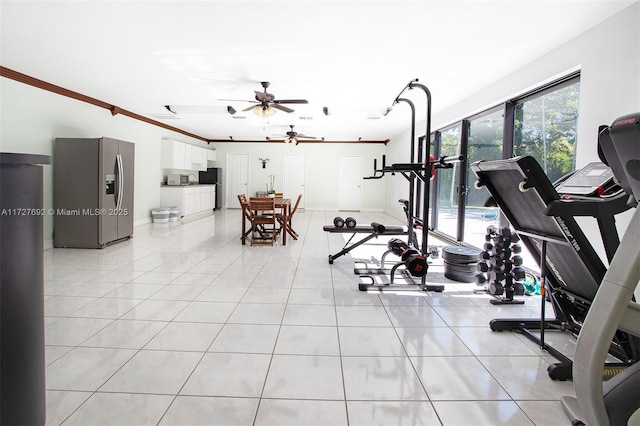 14135 N Miami Ave, Miami, FL 33168 - workout area featuring light tile patterned flooring, ceiling fan, and ornamental molding