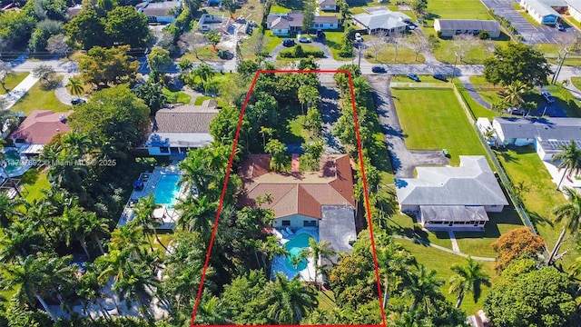 14135 N Miami Ave, Miami, FL 33168 - aerial view of residential area featuring a pool and property boundaries highlighted