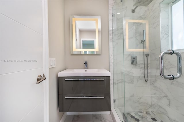 bathroom featuring walk in shower and vanity