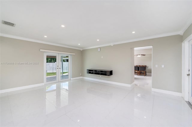 unfurnished living room with french doors and crown molding