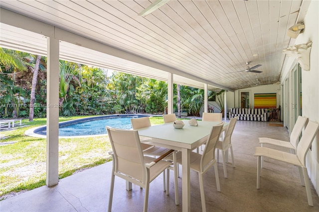 view of patio featuring ceiling fan