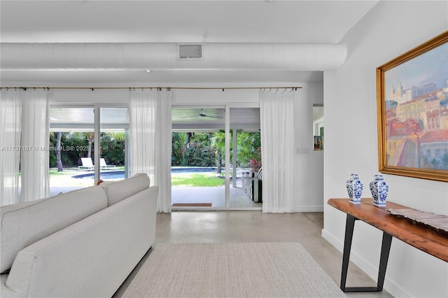 living room featuring plenty of natural light