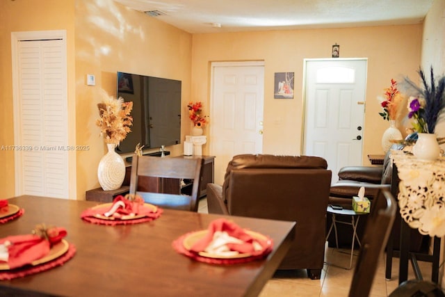 view of tiled dining space