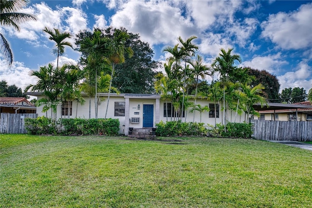 view of front of property with a front lawn