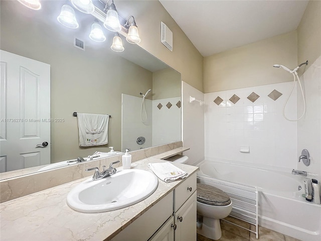 full bathroom featuring bathtub / shower combination, tile patterned floors, vanity, and toilet