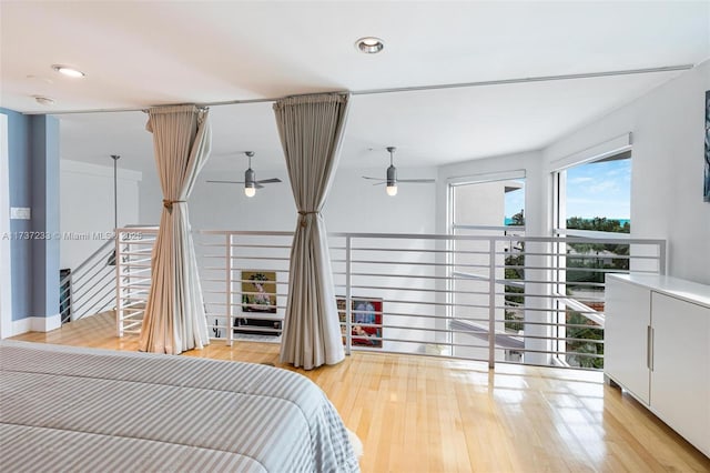 bedroom with wood-type flooring