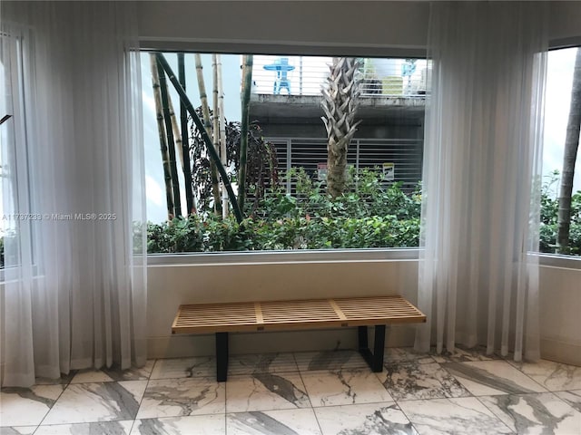 dining space featuring plenty of natural light