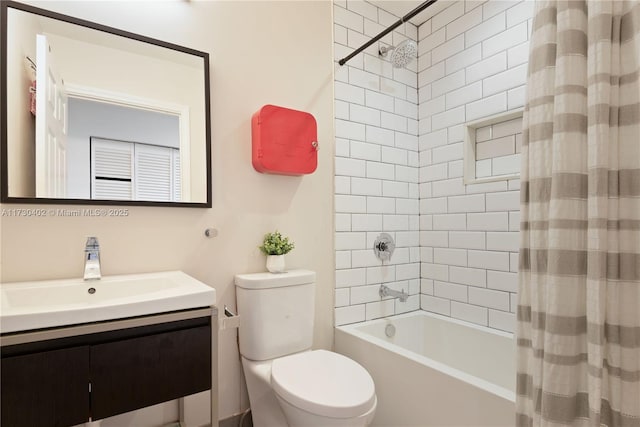 full bathroom featuring shower / bath combo, vanity, and toilet