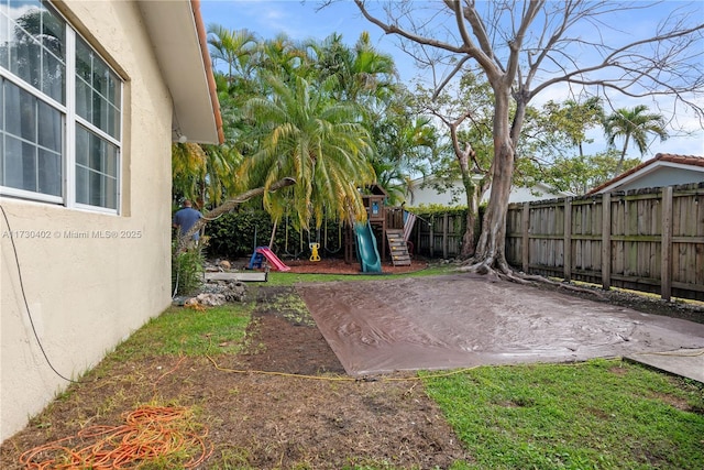 view of yard featuring a playground