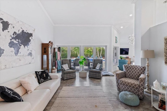 living room with crown molding and a towering ceiling