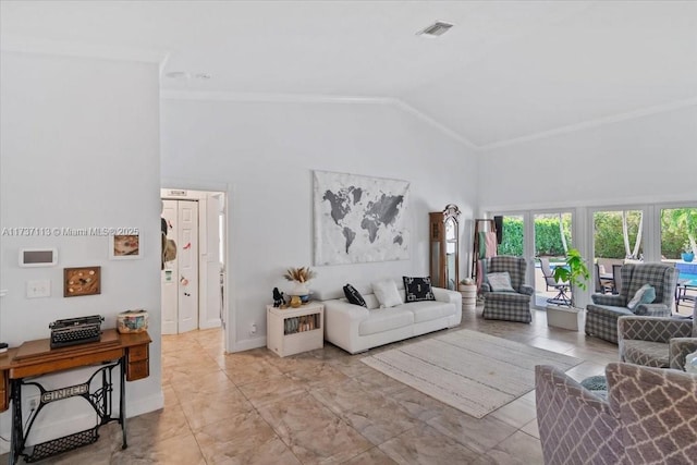 living room with ornamental molding and high vaulted ceiling