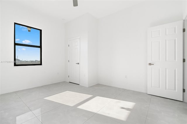 empty room featuring light tile patterned floors