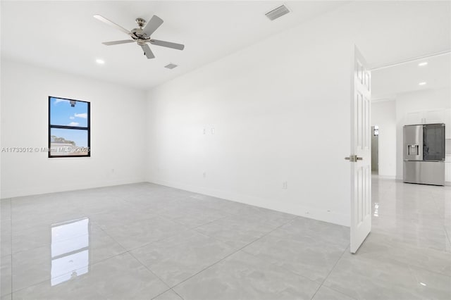 unfurnished room with recessed lighting, visible vents, ceiling fan, and baseboards