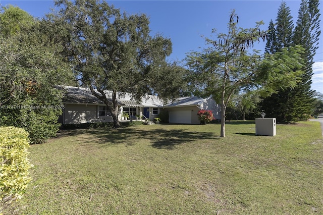 view of yard with a garage