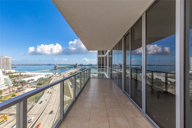 balcony featuring a water view