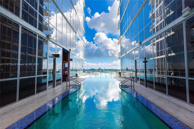 view of swimming pool featuring a patio