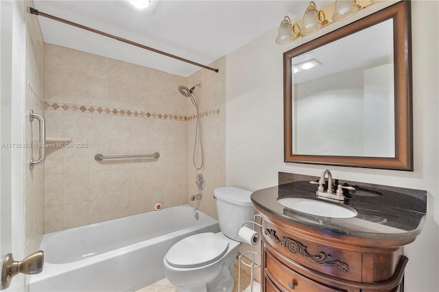 full bathroom with vanity, toilet, and tiled shower / bath combo