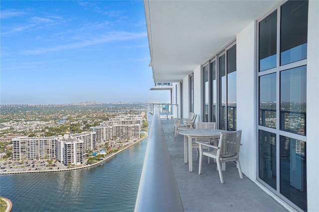 balcony featuring a water view