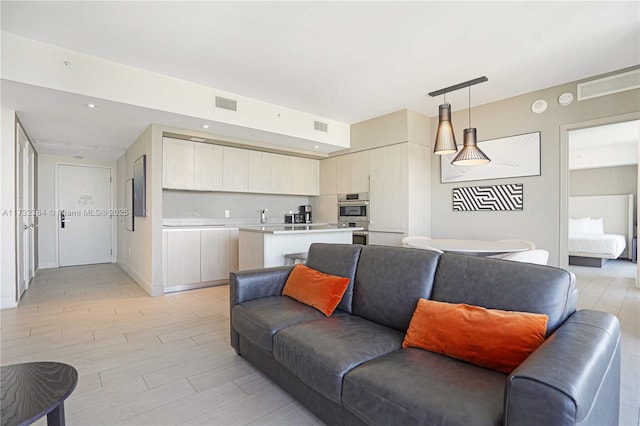 living room featuring light wood-type flooring