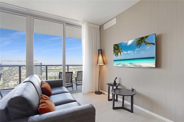 living room with a wall of windows