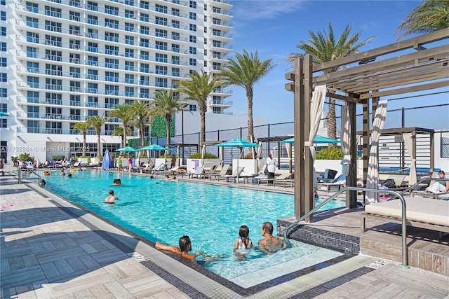 view of pool featuring a pergola and a patio