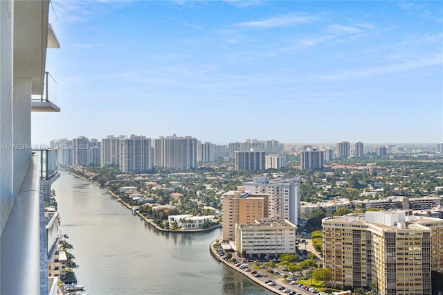 property's view of city featuring a water view