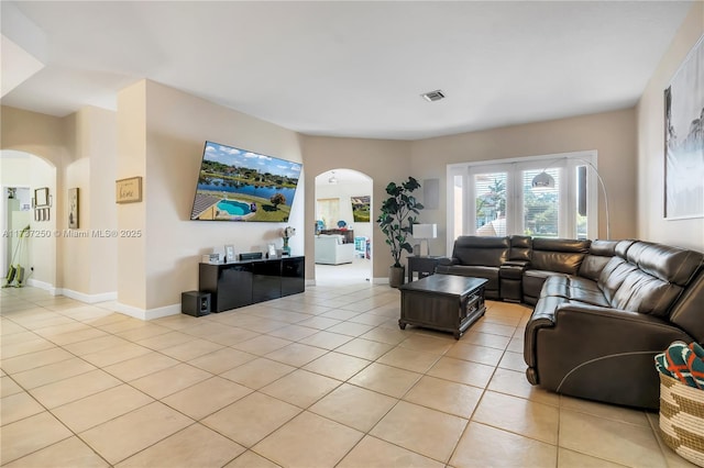 living room featuring light tile patterned floors