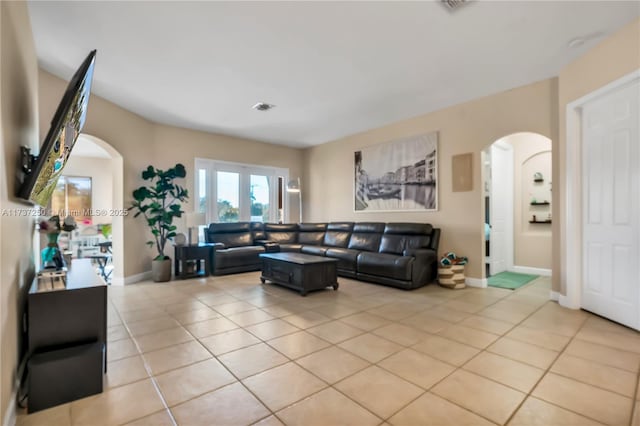 living room featuring light tile patterned floors